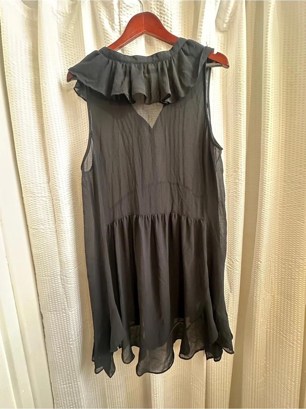 Anthropologie’s Sleeveless Black Asymmetrical Handkerchief-Hem Dress
